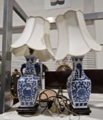Pair of Chinese-style blue and white pottery table lamps with shades (2) Condition Report Good