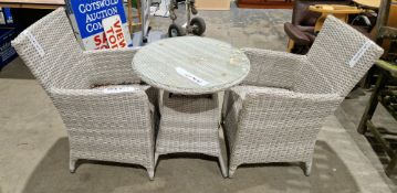 Grey rattan-style circular garden table, possibly by Bramble Crest, with glass top, 60cm diameter