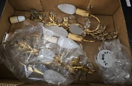 A pair of gilt metal floral wall lights with glass drops, together with some gilt metal ceiling