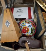 A pair of Carl Zeis 'Jena' 8x30 binoculars with leather case, a gilt framed circular wall mirror,