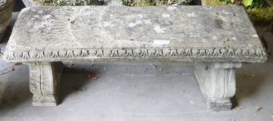 Reconstituted stone garden bench on lyre shaped supports, 115cm x 40cm x 40cm