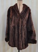 Two ladies' vintage fur coats