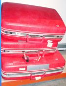 Three red Samsonite suitcases (3)  Condition Report Numerous scuffs and scratches, black marks and