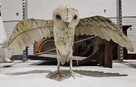 A metal sculpture of an owl Condition Report Height 33.5cm, wing span 65cm, width 29cm