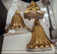 A pair of gilt painted pottery wall sconces, together with a rococo-style carved wood and gilt