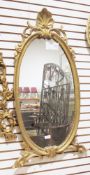 Gilt framed wall mirror with acanthus leaf design