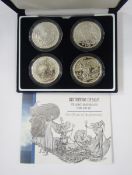 Royal Mint Britannia design 1oz silver bullion four coin set, the coins dated 1999, 2001, 2002 and