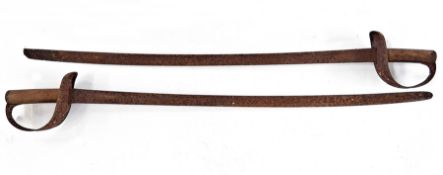 Two decorative cutlass style swords with incised half basket guards (2)