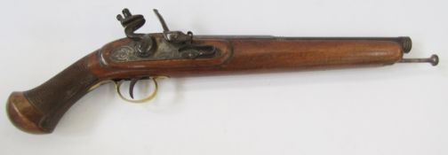 19th century flintlock pistol with brass trigger guard, engraved lock and ramrod.
