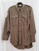 Four women's Royal Army Corps skirts and one jacket, and three wool 1949 pattern battledress