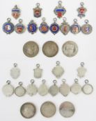 Twelve silver and enamel football medals/fobs, mainly Meon Valley Football League. Together with