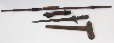 Javanese Kris with carved handle, decorative blade and carved scabbard, together with a blowpipe and
