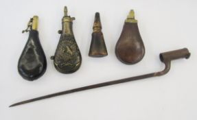 Four powder flasks and a 19th century socket bayonet.