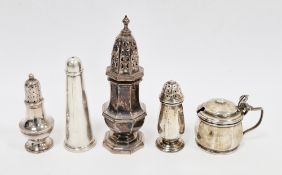 Victorian silver pepperette modelled as a caster, two other silver pepperettes, a silver mustard pot