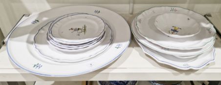 Collection of Moustiers faience (Segries) dinner wares, painted in the 18th century-style with