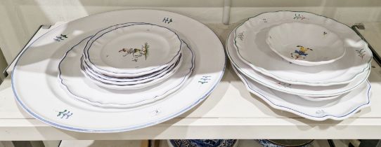 Collection of Moustiers faience (Segries) dinner wares, painted in the 18th century-style with