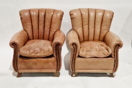 Pair of modern armchairs upholstered in leather, on short splayed supports (2)