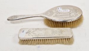 Early 20th century assembled silver-backed dressing table set, comprising: a clothes brush and a