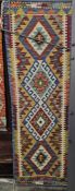 Chobi kilim orange ground runner with four stepped lozenge medallions, single geometric border,160cm