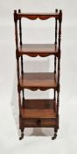 19th century mahogany four-tier whatnot of square form with slender turned baluster supports, drawer