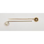Victorian gold stickpin set with a central diamond within wirework and bead mount, unmarked,