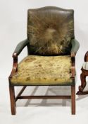 Green leather upholstered open armchair in the George III manner, with camel top rail, on square