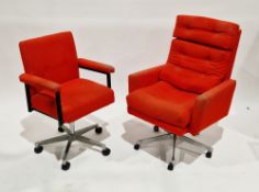 Two vintage office swivel chairs both upholstered in bright red, with chrome swivel bases (2)