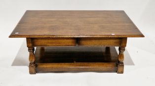 Kennedy of Ipswich oak coffee table, the rectangular top with thumbmould edge, over two frieze