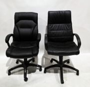 Two modern black vinyl upholstered office swivel chairs, adjustable height, on five-point star bases