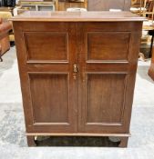 Late 19th / early 20th century mahogany cupboard, the rectangular top with ogee moulded edge, over
