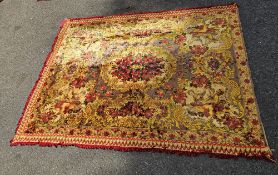 Chenille large red ground rug with central oval floral motif, pictorial spandrels featuring pair