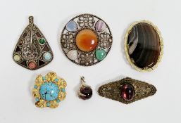 Gilt metal and banded agate brooch (damaged), a silver bird's claw pendant, and various other