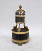 Sinclair Harding & Co reproduction table clock of cylindrical form with engraved decoration raised