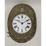 19th century French brass comtoise wall clock, of oval form with pressed floral and foliate scroll