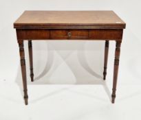 19th century mahogany fold-over tea table, the rectangular top with reeded edge, over a frieze