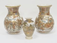 Pair of Japanese Satsuma baluster vases, Meiji period, painted with figures reading and holding