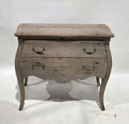 Modern French style distressed pine chest of two drawers of bombe form, the drawers with metal