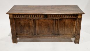 18th / 19th century oak coffer, the hinged lid with thumb moulded edge opening to a candle-box,