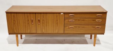 Mid-century Schreiber teak veneer sideboard comprising three drawers (the upper drawer with fitted
