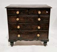 19th century stained pine chest of two short and three long drawers, on short turned feet,