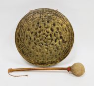 Brass gong of circular form with beater, 33cm diameter  Condition Report Gong with some surface