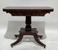 Regency flamed mahogany and cross-banded fold-over card table, the rectangular top with rounded