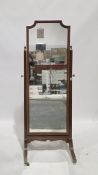 Early 20th century mahogany cheval mirror, the rectangular plate with shaped top, help on a square