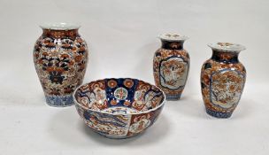 Pair of Japanese imari porcelain oviform vases, Meiji period, each painted with phoenix above