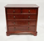 Marks & Spencers mahogany-finish chest, the rectangular top with canted corners, over two short