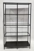 Ikea Vittsjo shelving units with black finished steel frame, three tinted glass shelves and solid