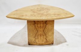 Hands of Wycombe burr wood veneer table of curved triangular form, on a substantial curved