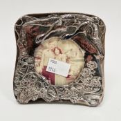 Silver fronted photograph frame, London 1985, Keyford Frames Ltd, with embossed decoration of two