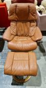 Ekornes stressless reclining armchair with brown leather upholstery, on circular laminate bases with