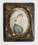 Late 19th century English School  Watercolour on ivory Portrait miniature of a seated lady, turned